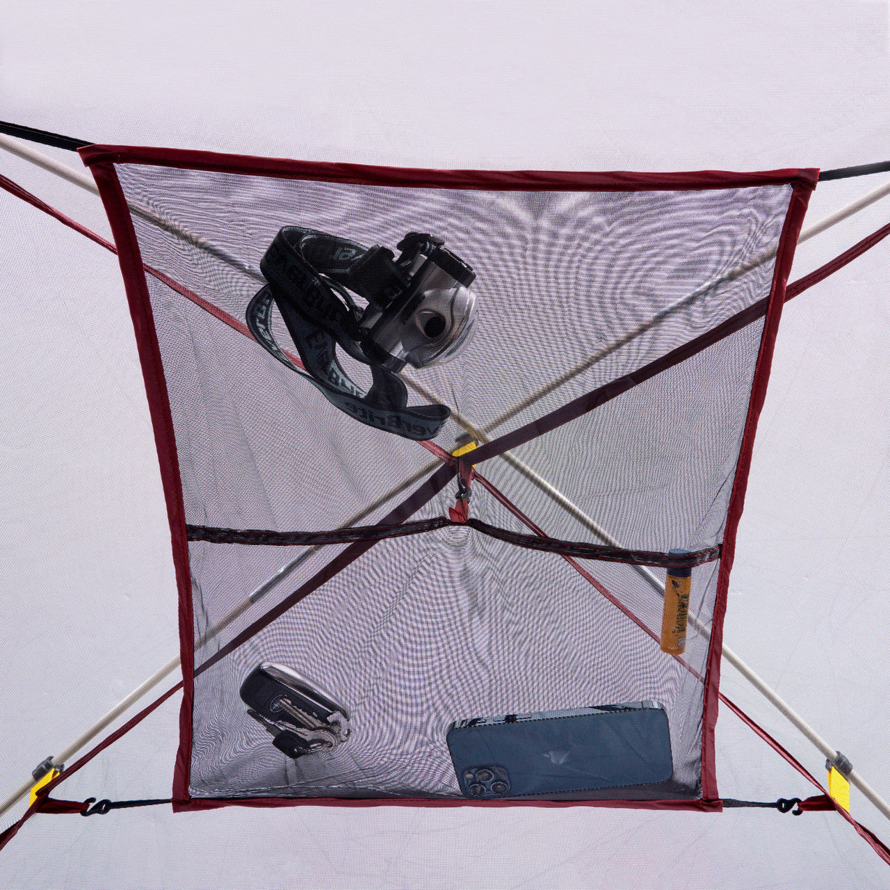 Close up of Sierra Designs Alpenglow 6 tent, showing gear attic