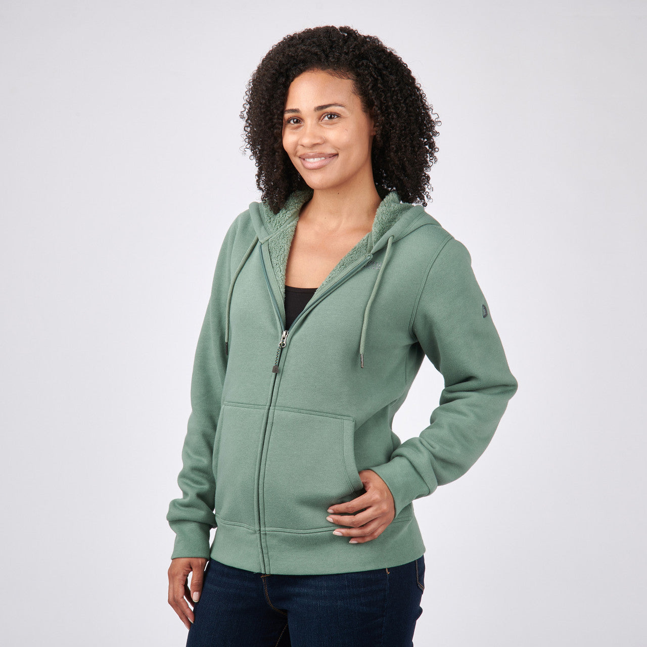 Woman wearing Sierra Designs Women's Angora Hoodie, Sage, side view