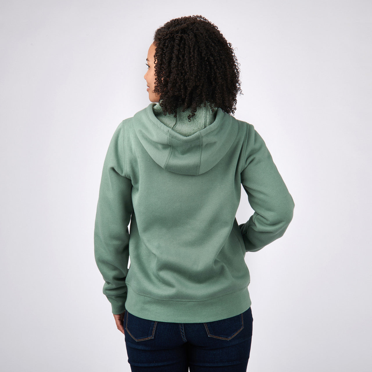 Woman wearing Sierra Designs Women's Angora Hoodie, Sage, rear view