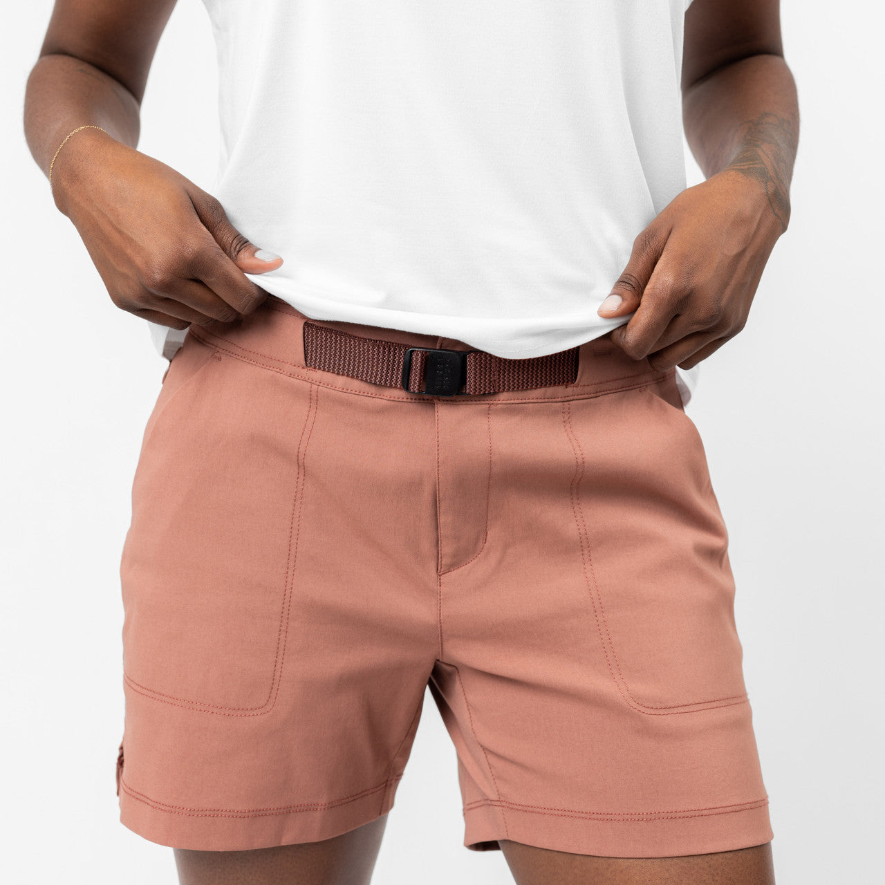 Close up of woman wearing Sierra Designs Women's Fredonyer Stretch Short, showing belt