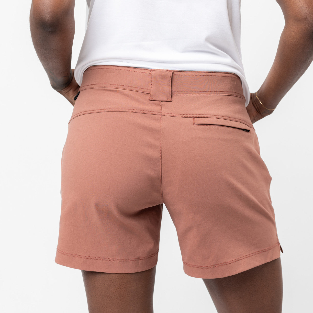 Close up of woman wearing Sierra Designs Women's Fredonyer Stretch Short, rear view