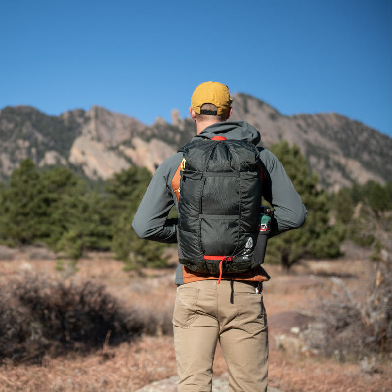 Sierra Designs Flex Trail 20-30 backpack lifestyle photo mountains