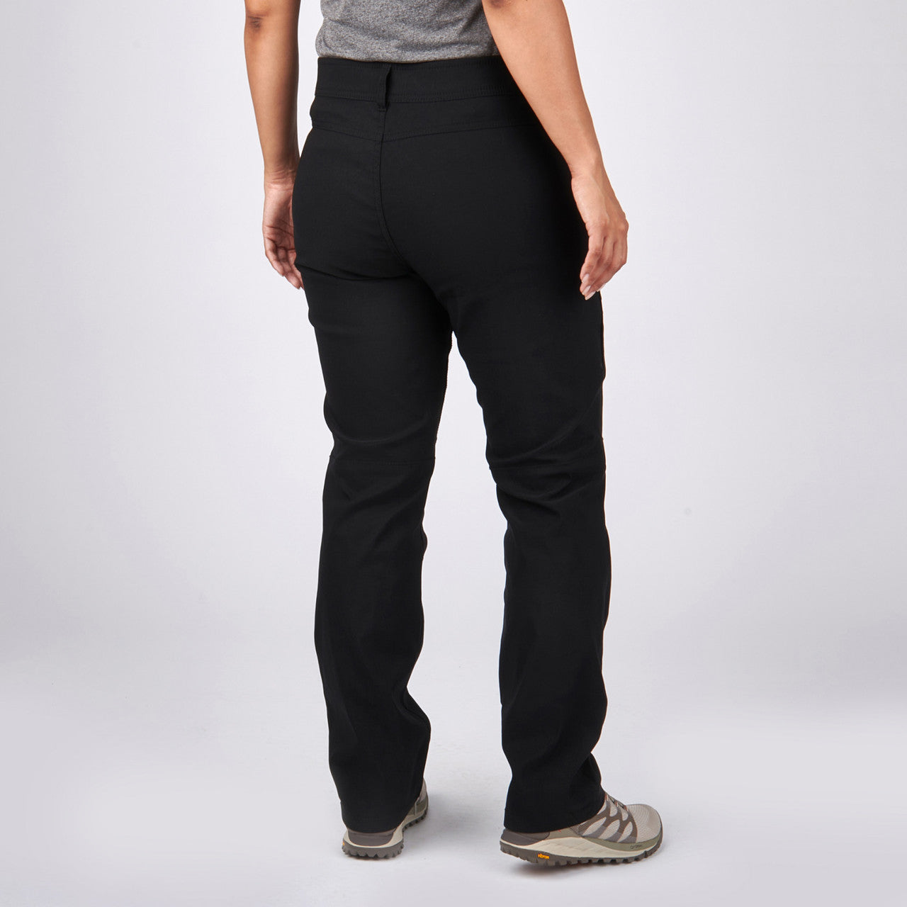 Woman wearing Sierra Designs Women's Inyo Stretch Pant, Black, rear view