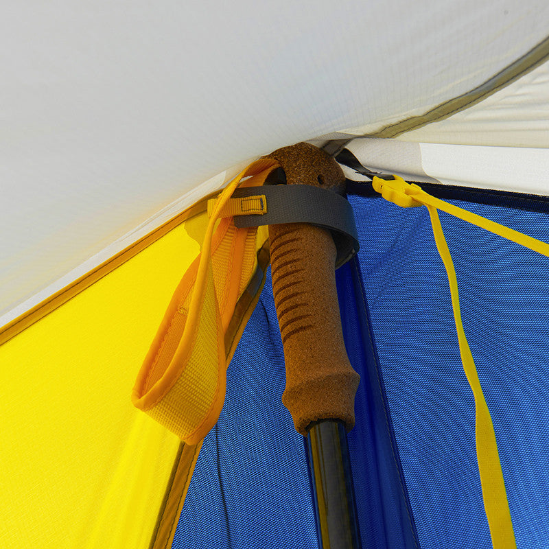 Close up view of the inside of the Sierra Designs High Route 1 FL showing a trekking pole attached to the inside of the tent