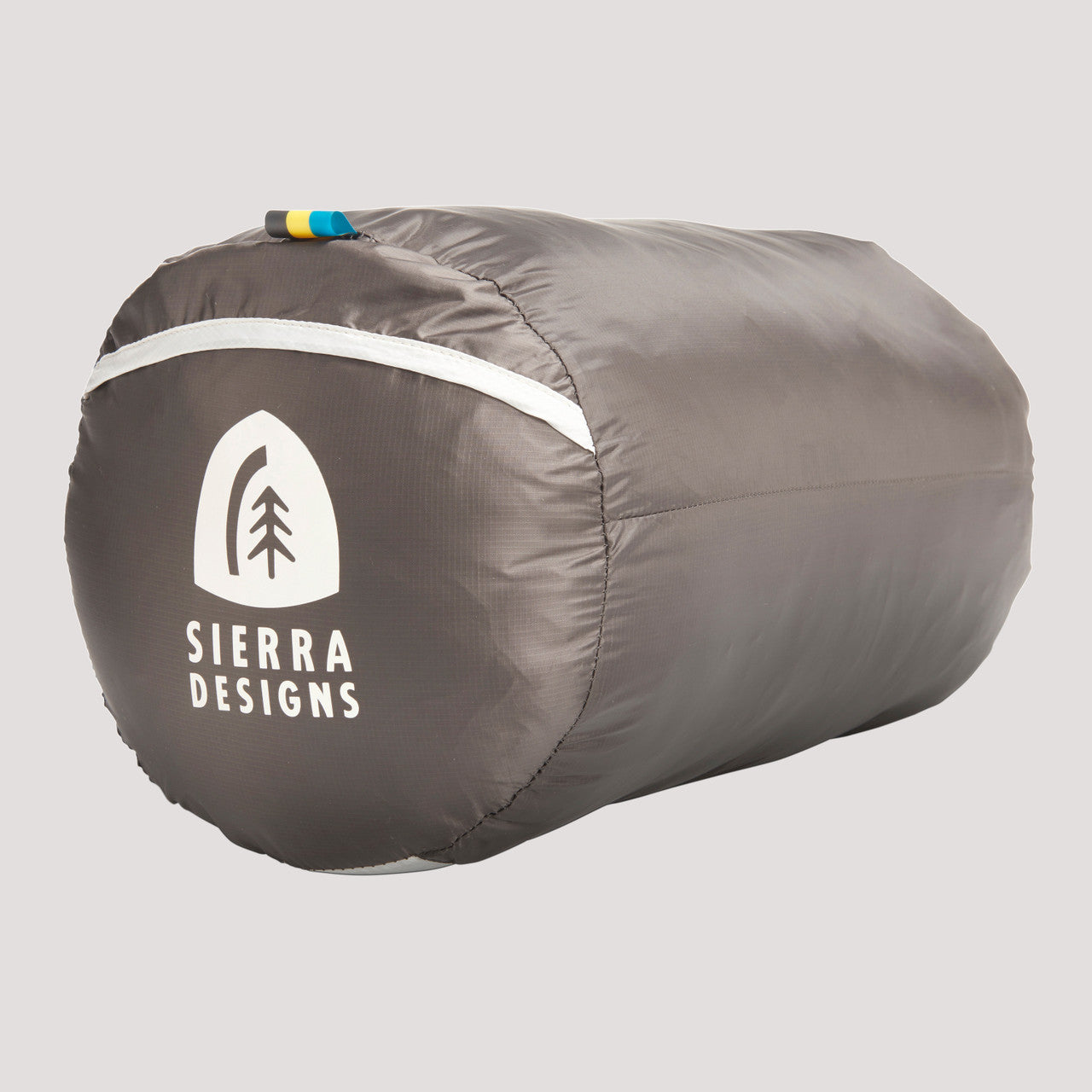Sierra Designs Backcountry Bed 650 / 20 Degree sleeping bag, packed inside nylon stuff sack